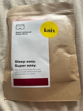 knix kraft pouch with yellow logo and white label